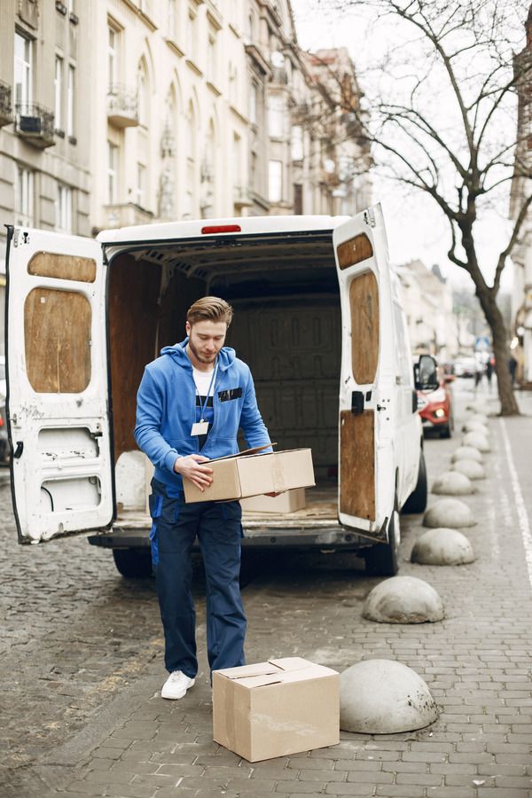 man-by-truck-guy-delivery-uniform (2).jpg